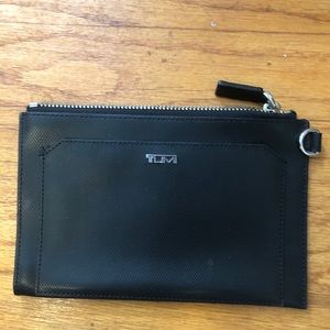 Tumi clutch
